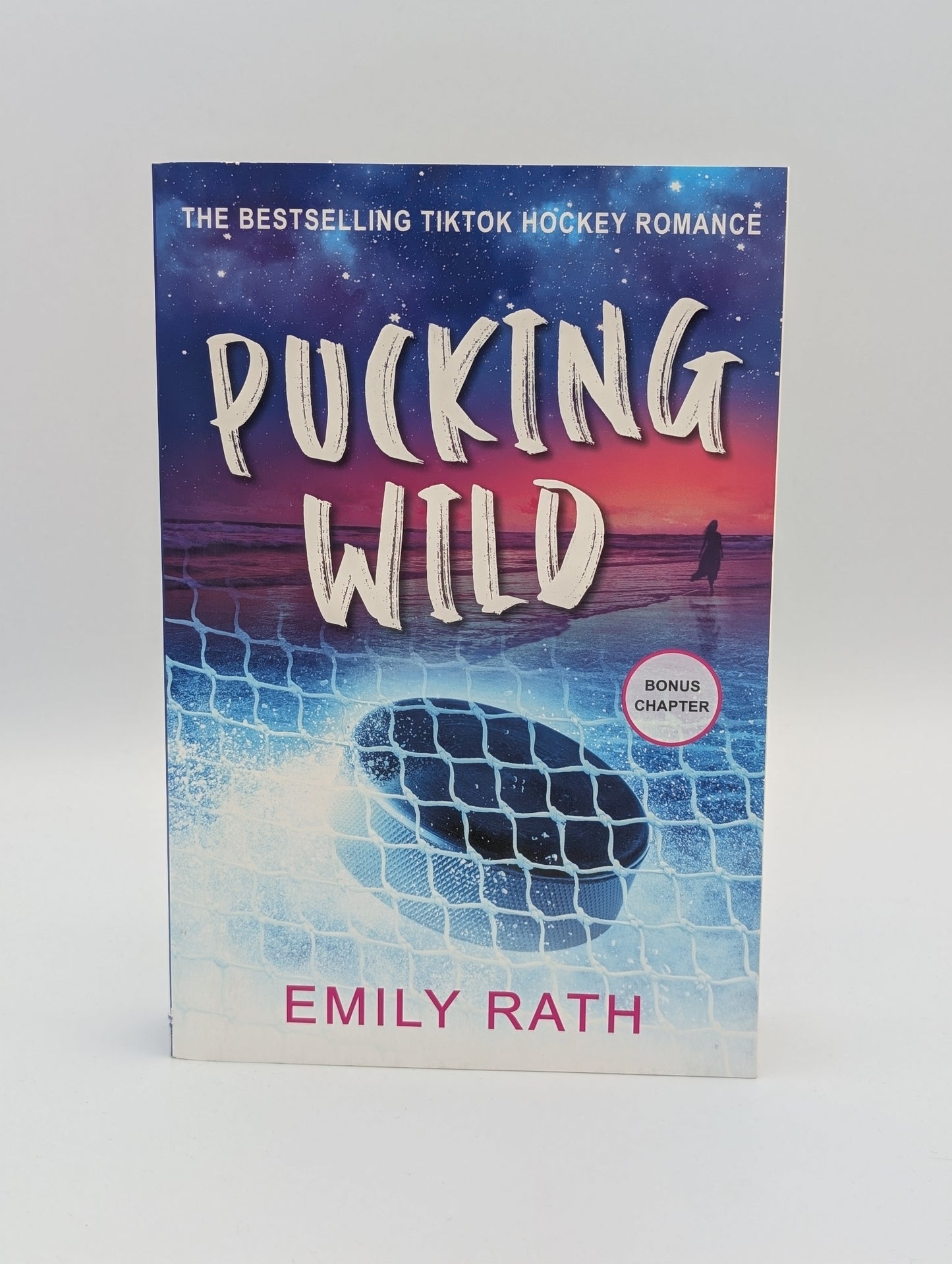 Pucking Wild: A Reverse Age Gap Hockey Romance (Jacksonville Rays Hockey)