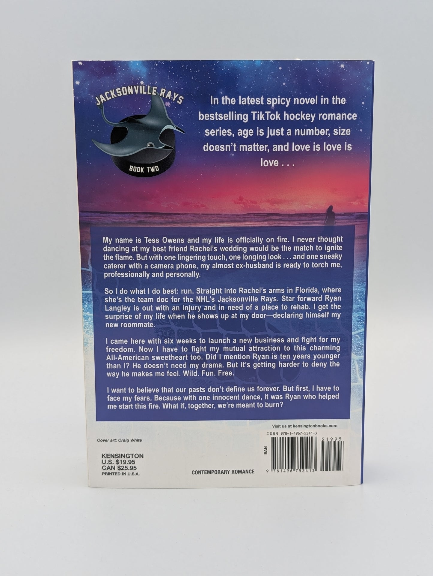 Pucking Wild: A Reverse Age Gap Hockey Romance (Jacksonville Rays Hockey)