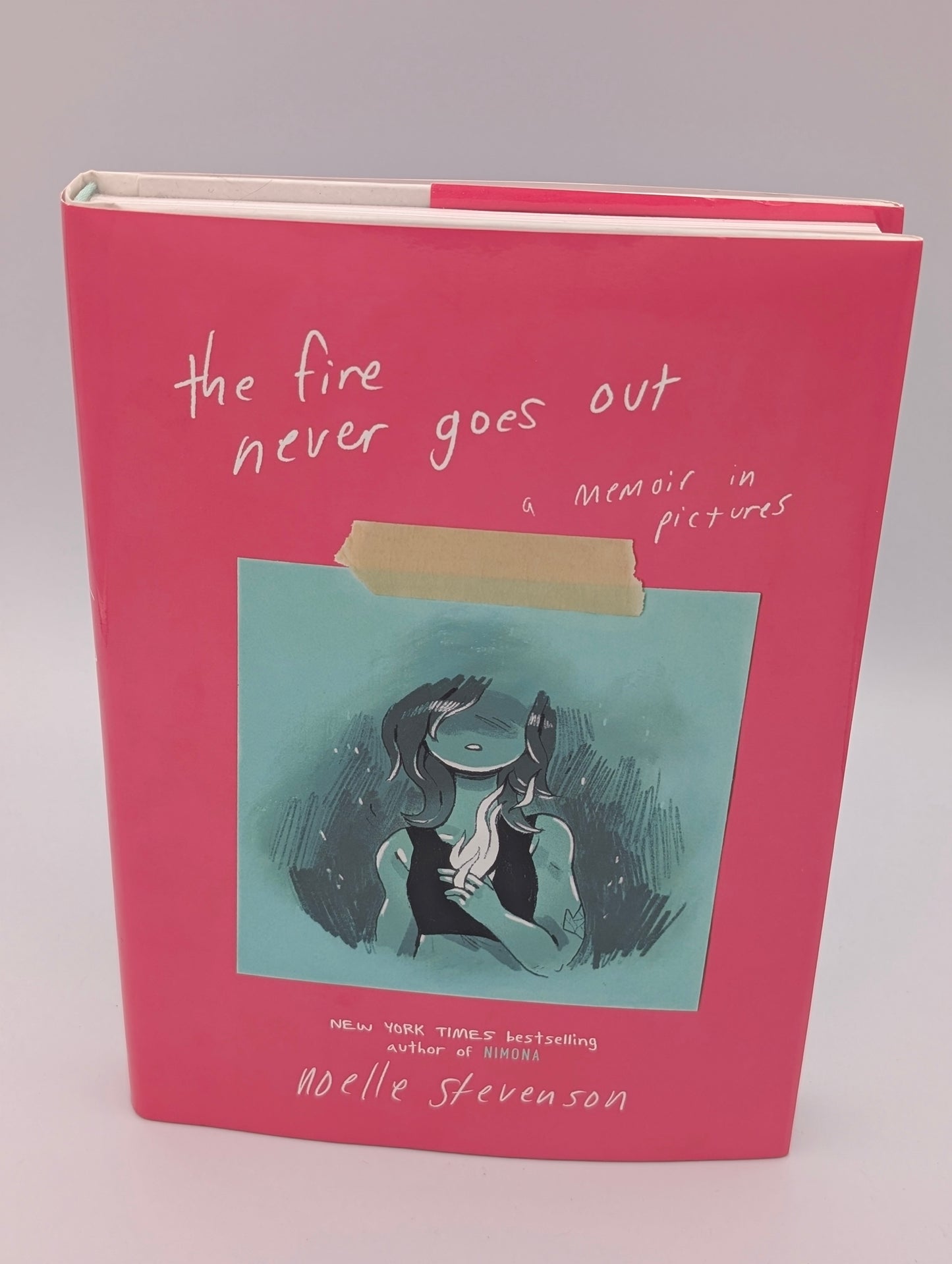 The Fire Never Goes Out: A Memoir in Pictures, A Graphic Memoir